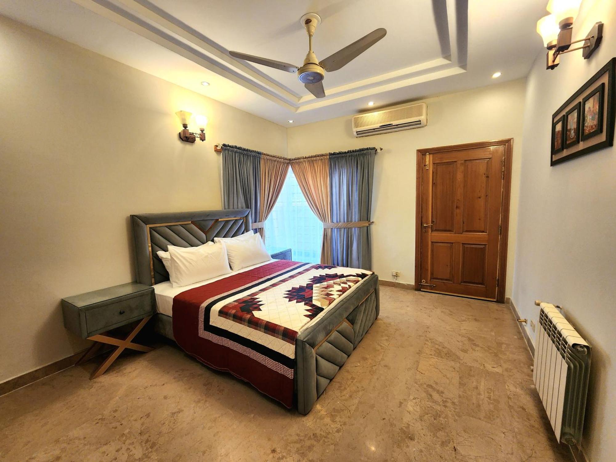 The Millenial Apartments & Suites Bahria Town Rávalpindí Pokoj fotografie