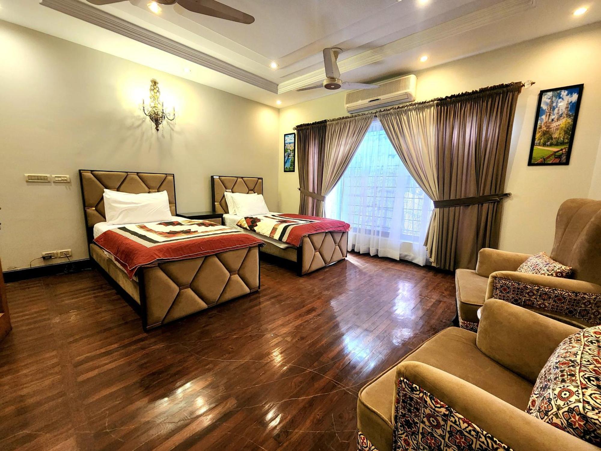 The Millenial Apartments & Suites Bahria Town Rávalpindí Pokoj fotografie