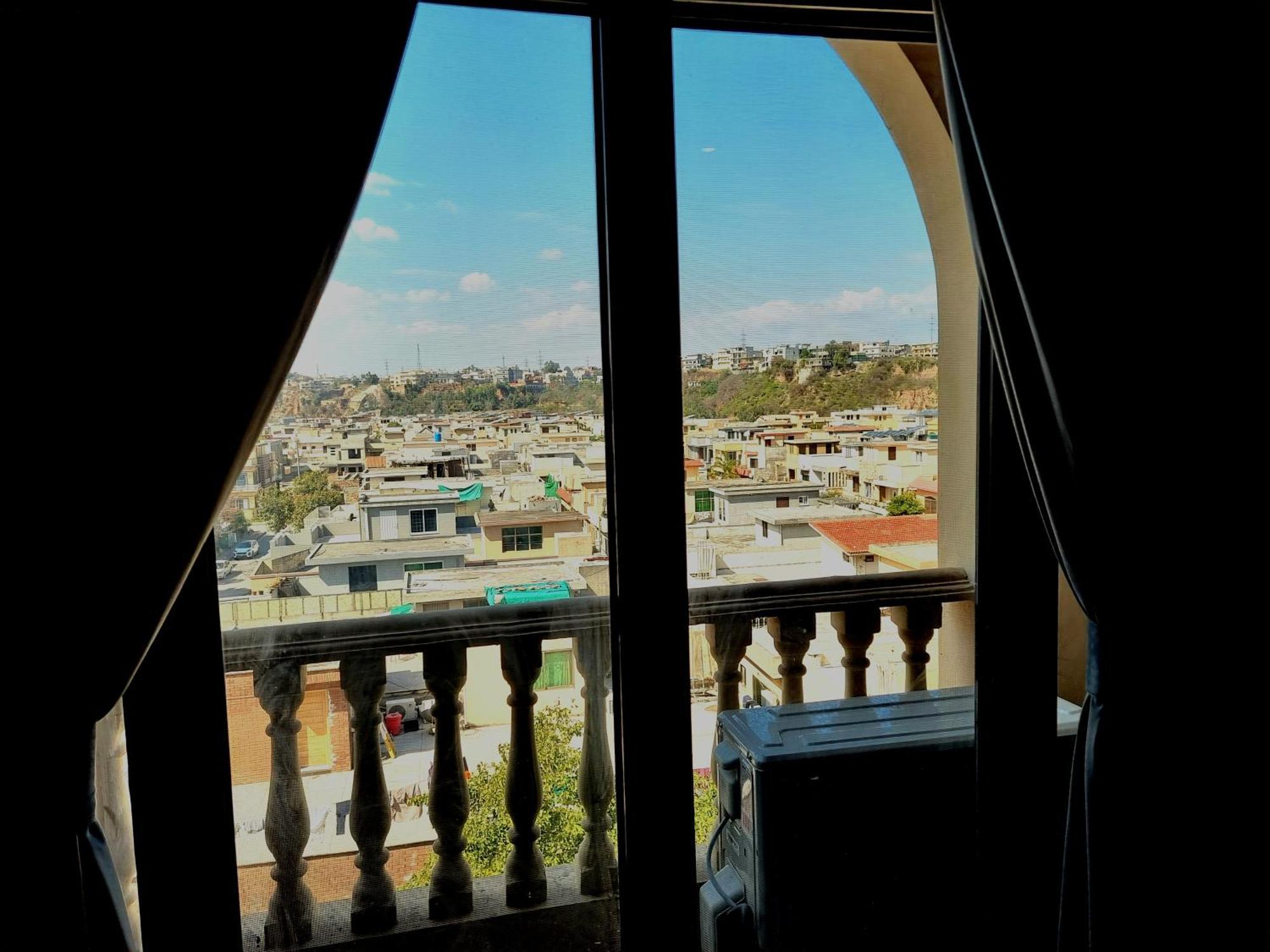 The Millenial Apartments & Suites Bahria Town Rávalpindí Pokoj fotografie