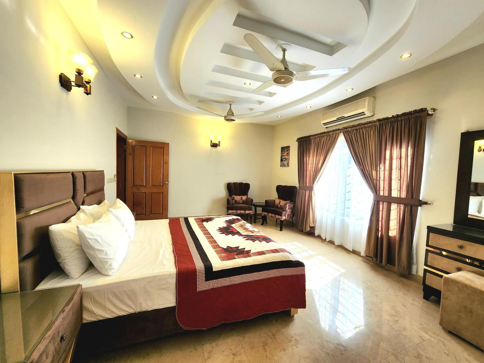 The Millenial Apartments & Suites Bahria Town Rávalpindí Pokoj fotografie